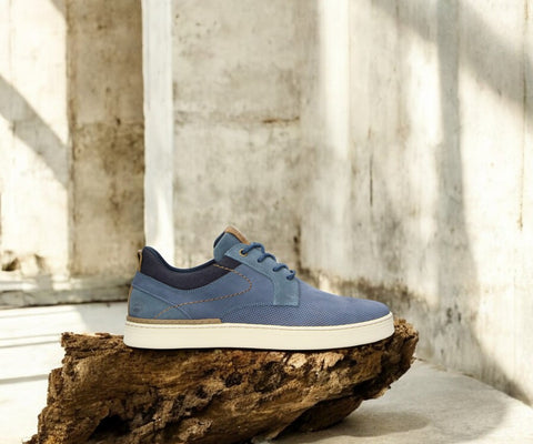 The Bullboxer 7CI0030101 4100 Navy Leather Men's Sneaker combines sleek sophistication with everyday comfort. Crafted from high-quality navy leather, this sneaker is perfect for those who want a versatile, stylish shoe that pairs effortlessly with casual or smart-casual outfits. Whether you're running errands or out with friends, this sneaker delivers both style and comfort.