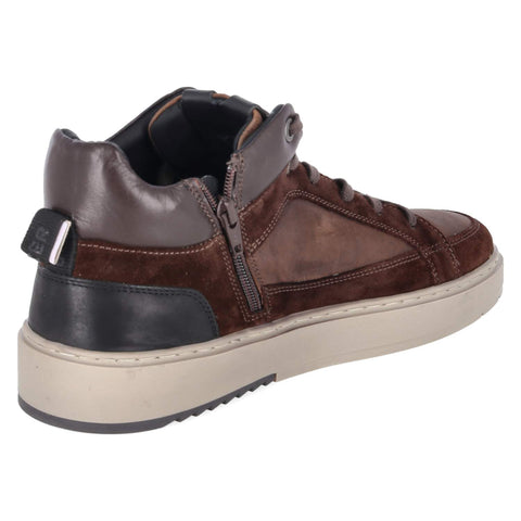 “Sneaker” is already English.  UK English equivalent: “trainer” (plural: “trainers”).